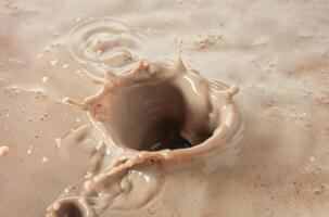Splash of cocoa close up photo