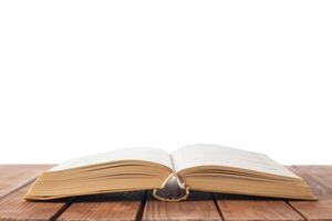 Open book on table with isolated background photo