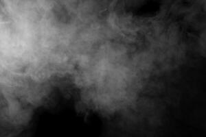 Black and white photo of smoke on a black background