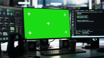 Chroma key displays in server farm displaying node tree programming tool detecting gear malfunctions. Visual programming software on isolated screen mockup computer tracking data center performance video
