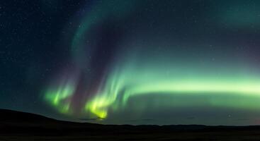 Ethereal Aurora Display Over a Somber Horizon - Generated using AI photo