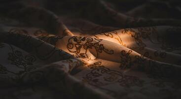 Intricate patterned textile under soft light creating a sense of mystery - Generated using AI photo