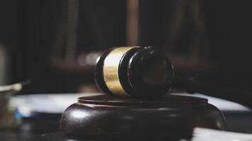 Judge's gavel on a wooden table video