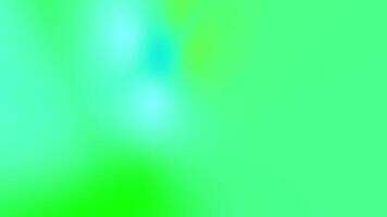 A green and blue blurred background with a white object video