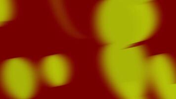 A red and yellow abstract background with a blurry image video
