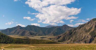 Beautiful time-lapse with oboaks running across the sky against the backdrop of the Altai Mountains video