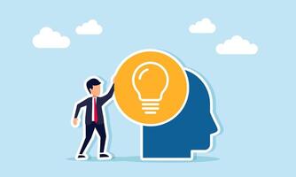 Businessman standing next to an icon shaped like a head with a lightbulb symbol, illustration of excellence in thinking when designing creative ideas vector