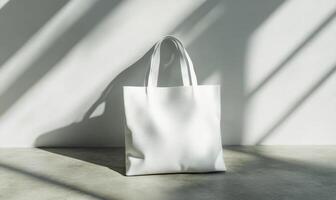 A white bag is sitting on a concrete floor in front of a window photo