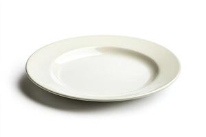 Empty White Plate Isolated on White Background Close Up Studio Shot photo