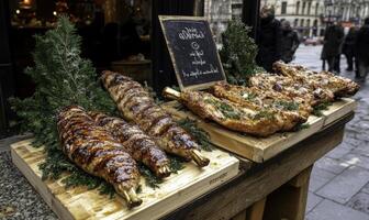 A display of meat on wooden trays in front of a store photo