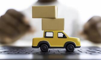 A small toy car with boxes on top of it photo