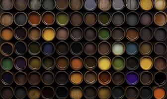 Vibrant Collection of Circular Paint Containers Showcasing a Spectrum of Colors and Textures Perfect for Artistic Inspiration and Creative Projects photo