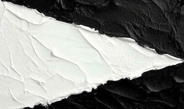 Abstract textured background in black and white featuring contrasting paint strokes, creating a modern and striking visual effect for artistic projects photo