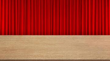 A beautiful empty wooden table with a red curtain as a background. photo