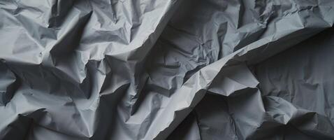 Dark Gray Crumpled Paper Texture Background. photo