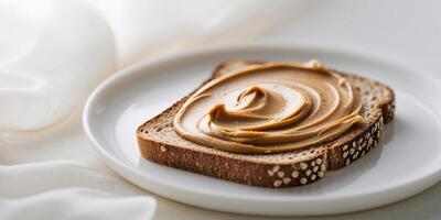 Bright and Inviting Image of Toast with Smooth Peanut Butter Spread for Breakfast. photo