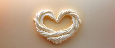 Heart Shape Created with Cream and Milk on a Soft Background in Subtle Warm Tones. photo