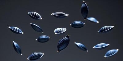 A group of black seeds floating in the air photo
