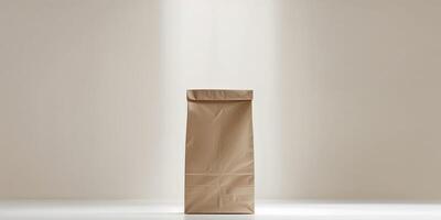 A simple brown paper bag standing upright on a white surface with soft lighting and a neutral background photo