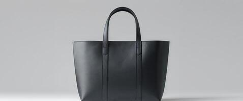 Stylish Black Tote Bag Mockup with Clean Lines and Modern Aesthetic Perfect for Branding and Design Presentations Ready for your Creative Touch. photo