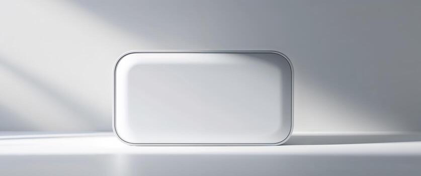 A white rectangular shape appears with soft rounded corners and shadows. photo