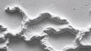 White decorative stucco surface creating textured background photo