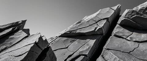 Close up of Sharp Edged Rocks Displaying Cracks and Weathering. photo