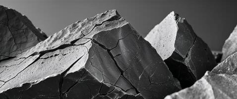 Close up of Sharp Edged Rocks Displaying Cracks and Weathering photo