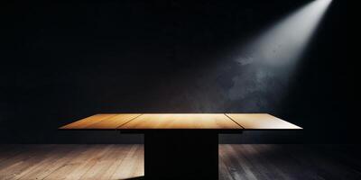 An empty table in a dark room with a spotlight photo