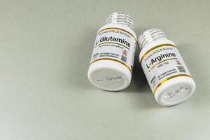 Lviv Ukraine 10.04.25 Dietary supplements displayed on a neutral surface photo