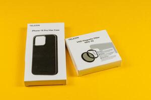 Lviv Ukraine 05.04.25 New iPhone 15 Pro Max case and magnetic filter pack photo