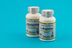 Lviv Ukraine 10.04.25 Dietary supplements including L Glutamine and L-Arginine photo