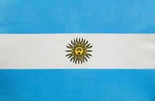 bandera de argentina con Dom emblema desplegado en tela foto