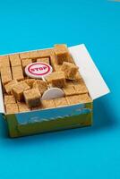Sugar cube box with a stop sign and vibrant background setting photo