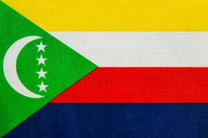 Flag of Comoros with vibrant color stripes photo