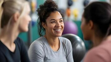 Trainers helping beginners during fitness session, inclusive coaching, supportive mood photo
