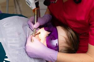 Experiencing a dental procedure with attention to detail in a contemporary clinic while basking in the warm glow of daylight photo