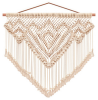 A beautiful macrame wall hanging with a geometric diamond pattern and tassels. png