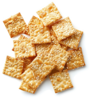 A pile of sesame seed crackers on a white background. png