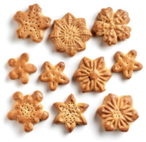 A collection of decorative, patterned cookies in snowflake and flower shapes. png
