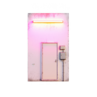 A modern, minimalist door set against a wall illuminated with pink neon lights, creating an intriguing and colorful contrast. png