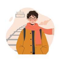 Young man wearing orange scarf and jacket waiting at train station platform with backpack in autumn setting vector