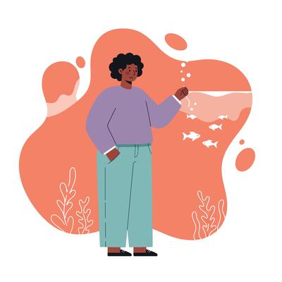 Person interacting with digital fish in coral reef environment with orange background and casual clothing