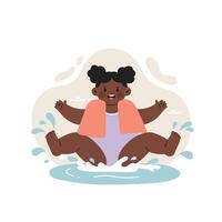 Happy African American toddler splashing water in playful bath time with towel on shoulders and joyful expression vector