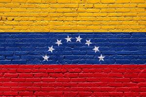 Grunge wall with abstract brick texture featuring the flags of venezuela , symbolizing national identity with rough, aged patterns and a mix of white, red, and other solid colors photo