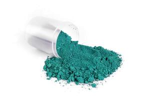 Turquoise Powder Used in Art and Crafts Displayed on a White Background photo