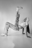 Dynamic Dancer in a Modern Studio Pose photo