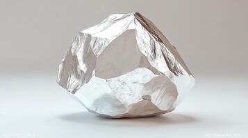 A shiny, irregular metallic rock on a light background. photo