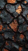 Cracked surface with glowing highlights. photo