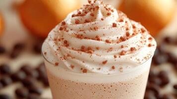 Creamy beverage topped with whipped cream and cocoa. photo